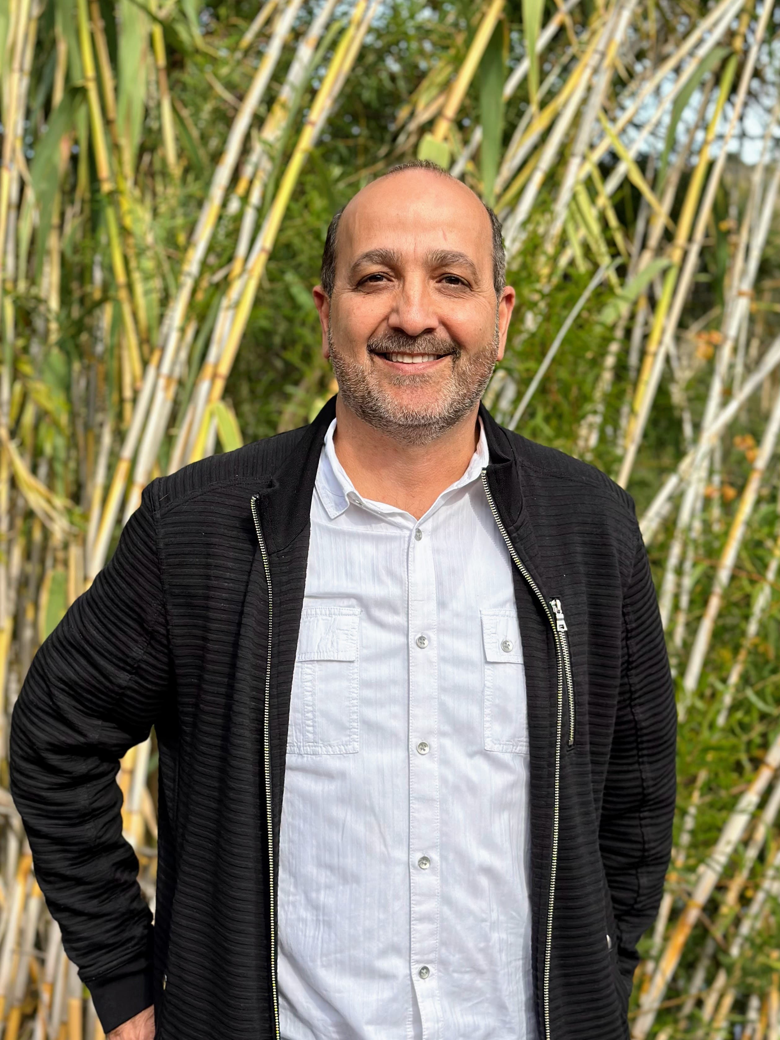 Portrait of Ismail Qaddoura (he/him)